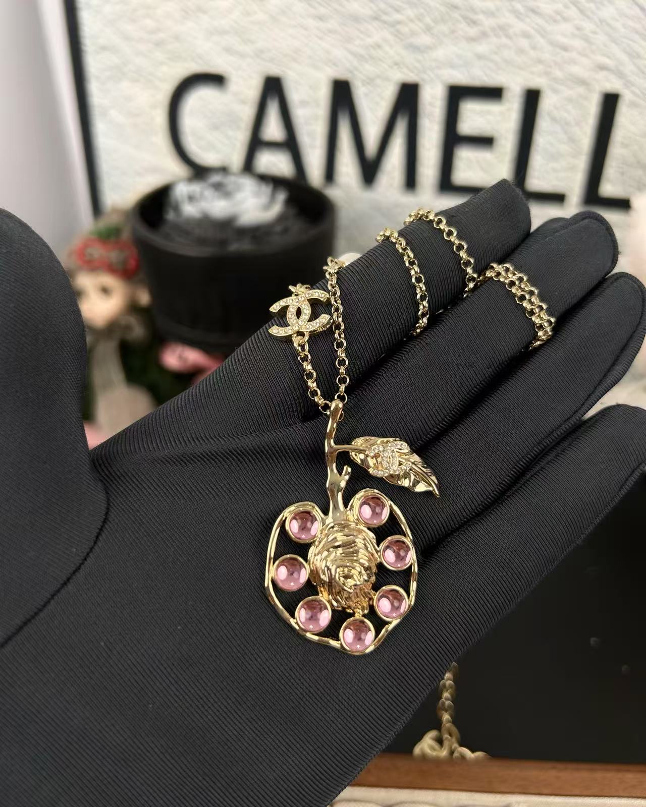 Chanel Pink Rhinestone Peach Pendant Necklace