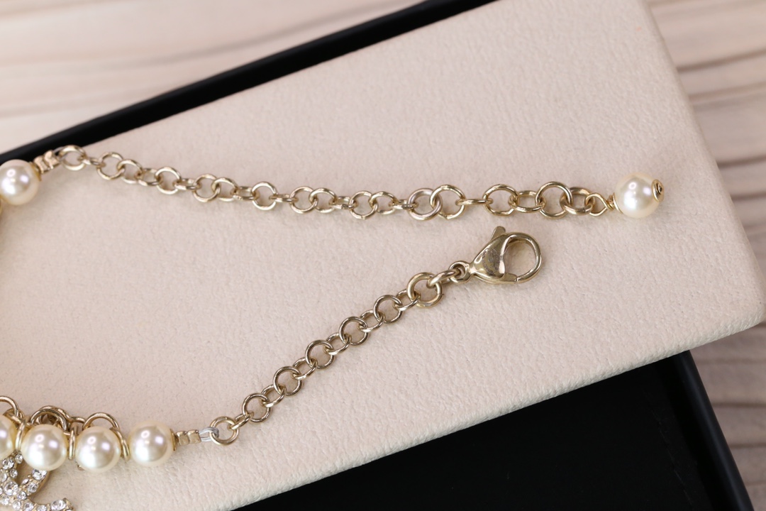 Chanel Bird CC Charms Chain Pearl Tassel Bracelet - Image 9