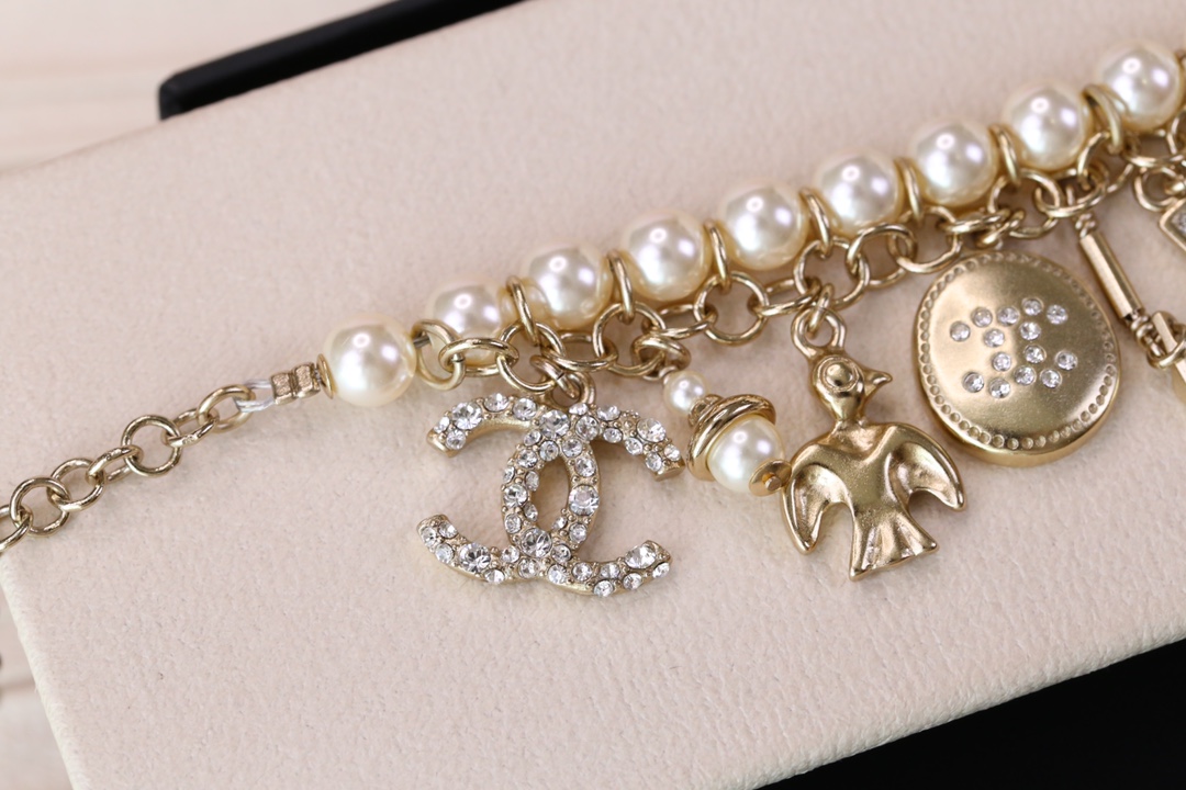 Chanel Bird CC Charms Chain Pearl Tassel Bracelet - Image 8