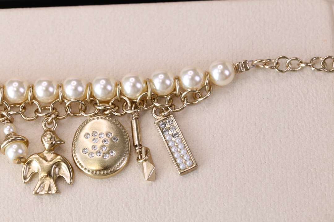 Chanel Bird CC Charms Chain Pearl Tassel Bracelet - Image 7