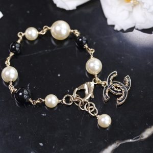 Chanel Black Bead Vintage Pearl Bracelet with CC Charm