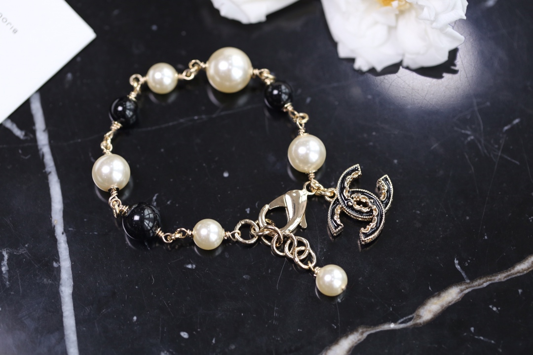 Chanel Black Bead Vintage Pearl Bracelet with CC Charm